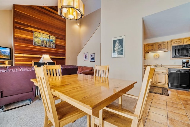 91200 Ryan Gulch Rd Unit 91223, Silverthorne, CO 80498 - dining room with light tile patterned floors and a high ceiling
