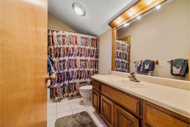91200 Ryan Gulch Rd Unit 91223, Silverthorne, CO 80498 - full bathroom featuring vaulted ceiling, tile patterned flooring, vanity, toilet, and a shower with shower curtain