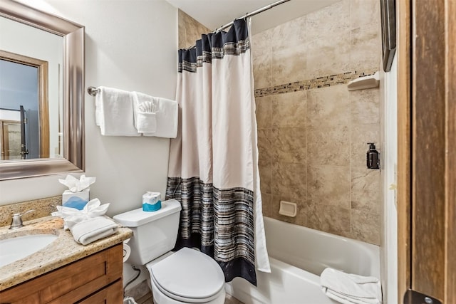 full bathroom featuring vanity, toilet, and shower / tub combo with curtain