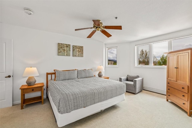 2700 Eagleridge Dr Unit N31, Steamboat Springs, CO 80487 - bedroom with light carpet and ceiling fan