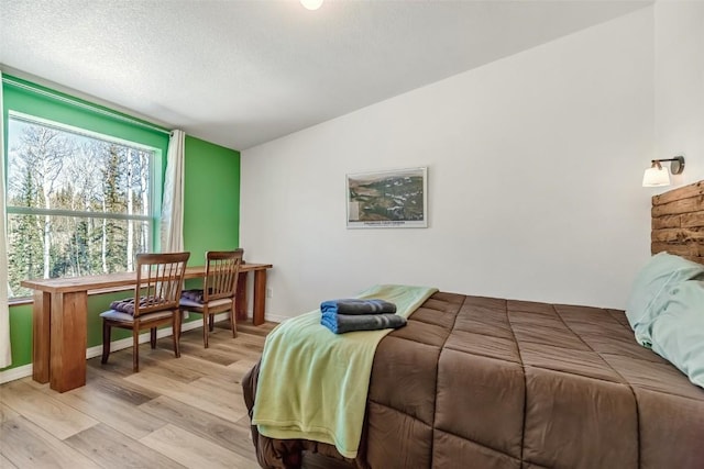 972 N Quarter Horse Rd, Jefferson, CO 80456 - bedroom featuring light wood-style floors and baseboards