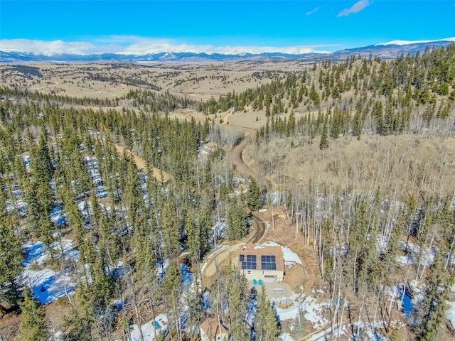 972 N Quarter Horse Rd, Jefferson, CO 80456 - aerial view featuring a forest view and a mountain view