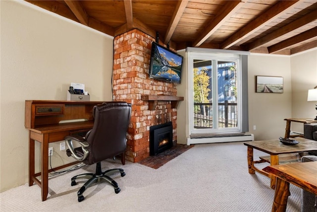 carpeted office space featuring a baseboard heating unit, wooden ceiling, beamed ceiling, and a fireplace