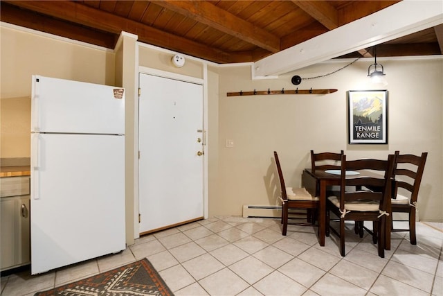 dining room with wood ceiling, baseboard heating, beamed ceiling, and light tile patterned flooring