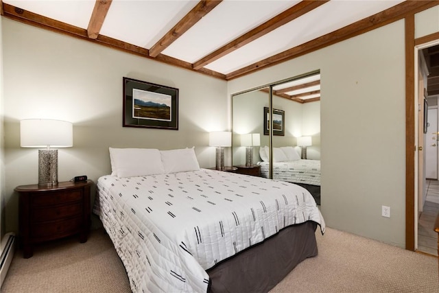 bedroom with a baseboard radiator, carpet, a closet, and beamed ceiling