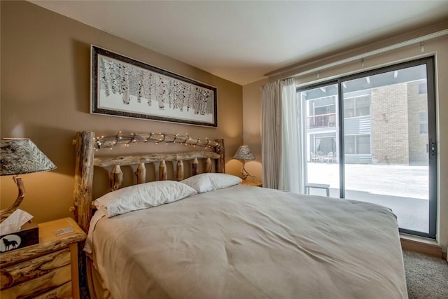 100 S Park Ave Unit E113, Breckenridge, CO 80424 - bedroom featuring access to outside and multiple windows