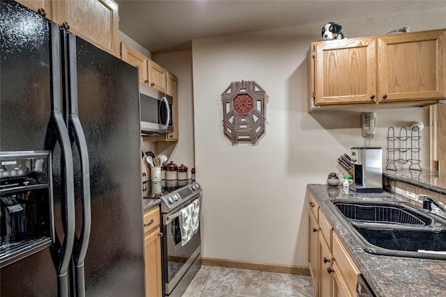 100 S Park Ave Unit E113, Breckenridge, CO 80424 - kitchen with appliances with stainless steel finishes and light brown cabinets