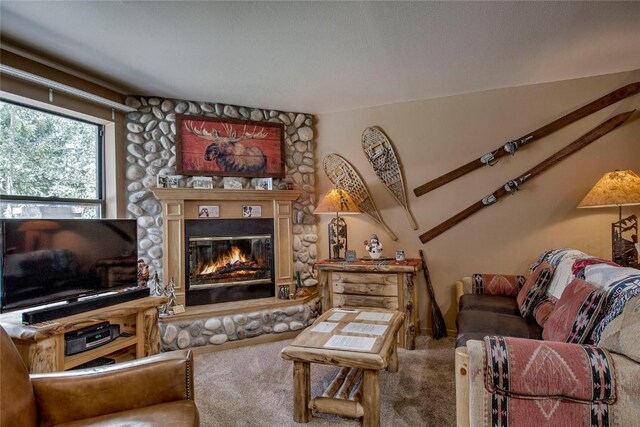 100 S Park Ave Unit E113, Breckenridge, CO 80424 - living area with carpet flooring and a stone fireplace