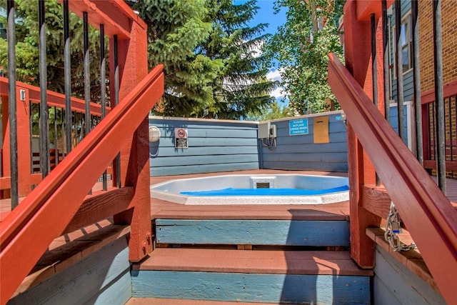 100 S Park Ave Unit E113, Breckenridge, CO 80424 - wooden deck with an outdoor hot tub