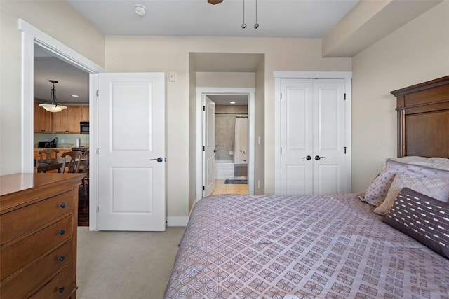 300 Base Camp Cir Unit 214, Granby, CO 80446 - bedroom with a closet, light colored carpet, and connected bathroom