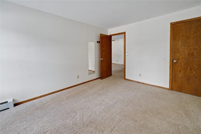89200 Ryan Gulch Rd Unit 208, Silverthorne, CO 80498 - carpeted empty room featuring baseboards and a baseboard heating unit