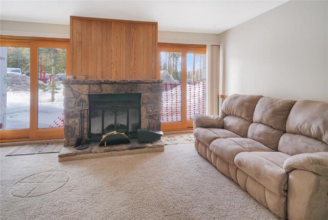 carpeted empty room featuring baseboards and a baseboard heating unit
