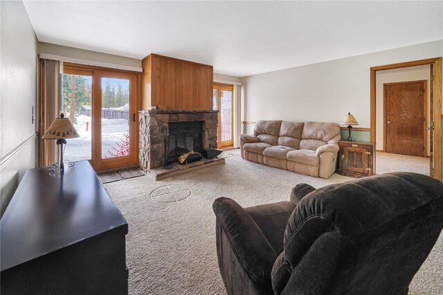 89200 Ryan Gulch Rd Unit 208, Silverthorne, CO 80498 - carpeted living area with a stone fireplace