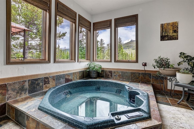 322 Davis Ct, Breckenridge, CO 80424 - misc room featuring stone tile flooring and a hot tub