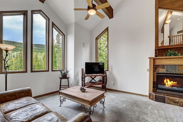 322 Davis Ct, Breckenridge, CO 80424 - living room with carpet flooring, lofted ceiling, ceiling fan, and a tile fireplace