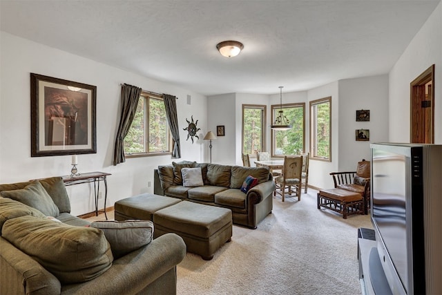 322 Davis Ct, Breckenridge, CO 80424 - living room with healthy amount of natural light and light carpet