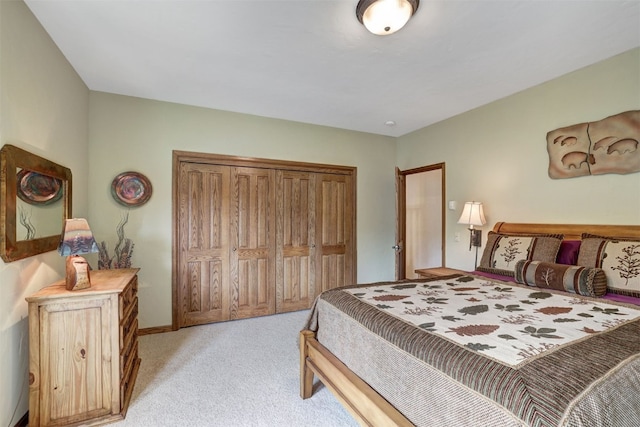 322 Davis Ct, Breckenridge, CO 80424 - bedroom featuring light carpet and a closet