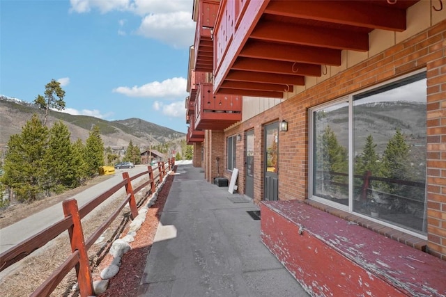 180 Evergreen Rd Unit 102, Dillon, CO 80435 - exterior space featuring brick siding and a mountain view