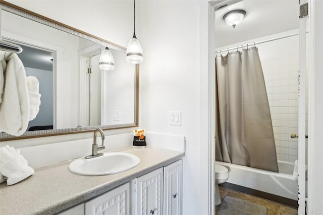180 Evergreen Rd Unit 102, Dillon, CO 80435 - bathroom with toilet, vanity, and shower / bathtub combination with curtain