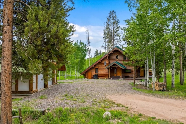 33000 Maricopa Trl, Oak Creek, CO 80467 - view of front of home featuring log siding and driveway