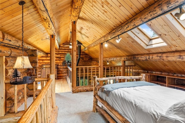 33000 Maricopa Trl, Oak Creek, CO 80467 - bedroom featuring rustic walls, wood ceiling, carpet, a skylight, and rail lighting