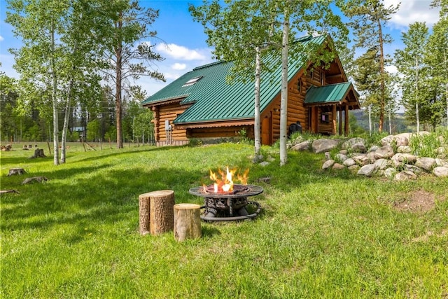 33000 Maricopa Trl, Oak Creek, CO 80467 - view of green lawn with a fire pit