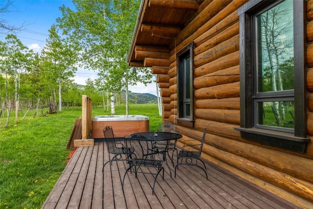 33000 Maricopa Trl, Oak Creek, CO 80467 - wooden terrace with a hot tub, outdoor dining area, and a yard
