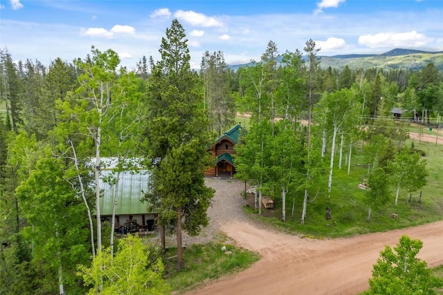 33000 Maricopa Trl, Oak Creek, CO 80467 - aerial view of property and surrounding area featuring a heavily wooded area and a mountainous background