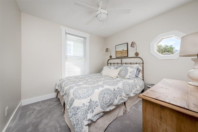 464 8th St, Steamboat Springs, CO 80487 - bedroom with carpet flooring, baseboards, and ceiling fan