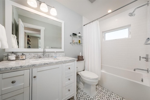 464 8th St, Steamboat Springs, CO 80487 - bathroom with vanity, shower / bathtub combination with curtain, toilet, and tile patterned floors