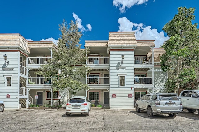 412 S Main St Unit 215, Breckenridge, CO 80424 - view of building exterior with uncovered parking