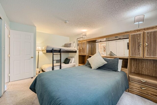 412 S Main St Unit 215, Breckenridge, CO 80424 - carpeted bedroom with a textured ceiling