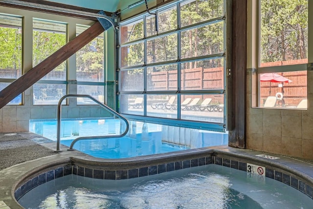 325 Four Oclock Rd Unit E202, Breckenridge, CO 80424 - indoor community pool featuring an in-ground hot tub