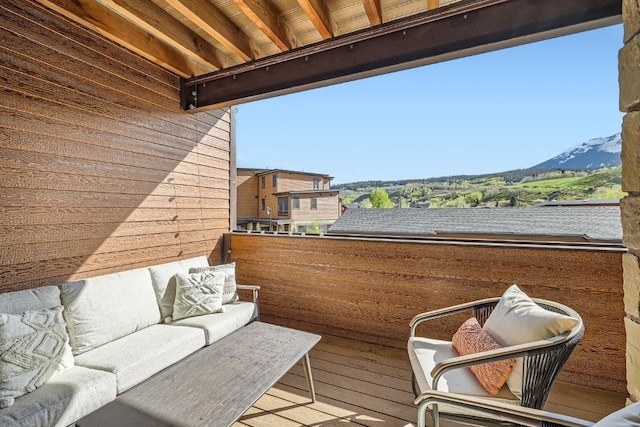 1090 Blue River Pkwy Unit 204, Silverthorne, CO 80498 - balcony featuring a mountain view and an outdoor living space