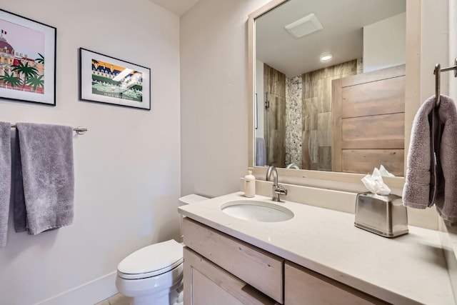 1090 Blue River Pkwy Unit 204, Silverthorne, CO 80498 - bathroom featuring vanity, toilet, a shower, and baseboards