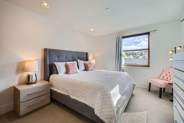 1090 Blue River Pkwy Unit 204, Silverthorne, CO 80498 - bedroom featuring light carpet, baseboards, and recessed lighting