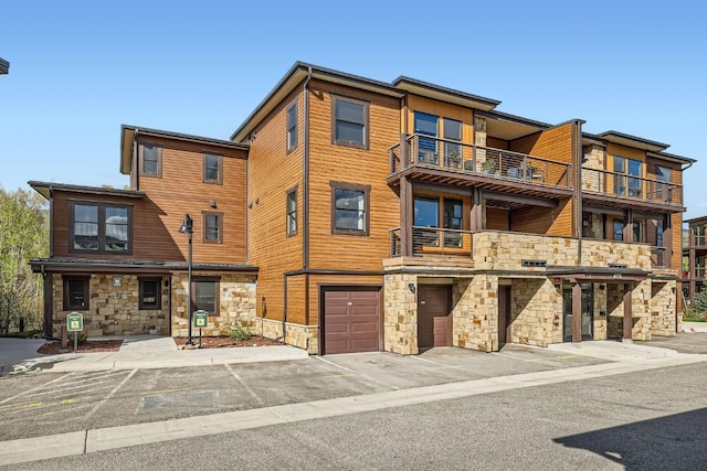 1090 Blue River Pkwy Unit 204, Silverthorne, CO 80498 - view of property with a garage and driveway