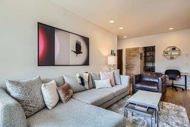 1090 Blue River Pkwy Unit 204, Silverthorne, CO 80498 - living room with wood-type flooring and recessed lighting