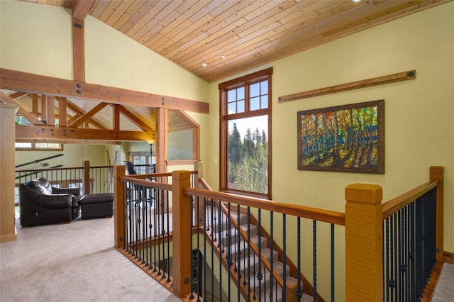 2760 Burgess Creek Rd Unit 2, Steamboat Springs, CO 80487 - hallway with wooden ceiling, vaulted ceiling, carpet flooring, and an upstairs landing