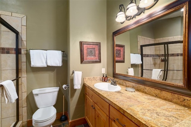 2760 Burgess Creek Rd Unit 2, Steamboat Springs, CO 80487 - bathroom with a shower stall, toilet, and vanity