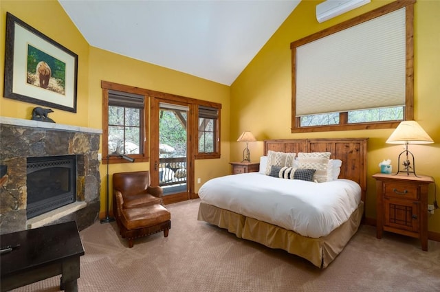 2760 Burgess Creek Rd Unit 2, Steamboat Springs, CO 80487 - bedroom featuring multiple windows, vaulted ceiling, carpet flooring, and access to outside