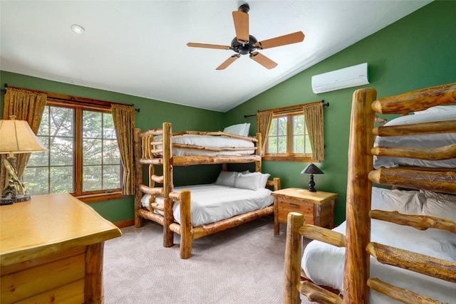 2760 Burgess Creek Rd Unit 2, Steamboat Springs, CO 80487 - carpeted bedroom featuring lofted ceiling, a ceiling fan, and a wall unit AC