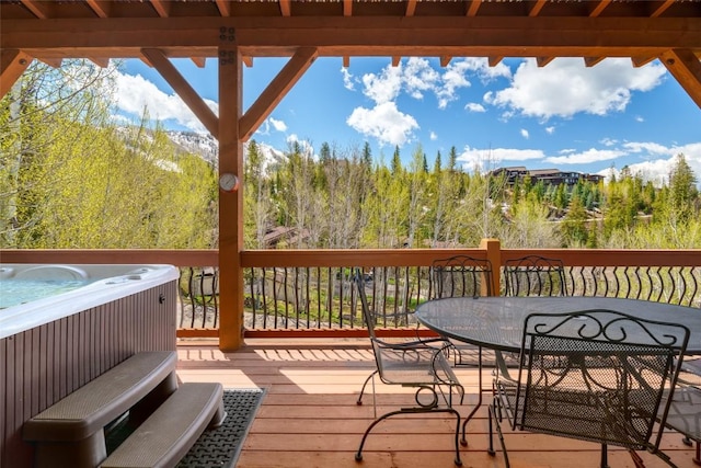 2760 Burgess Creek Rd Unit 2, Steamboat Springs, CO 80487 - wooden terrace featuring outdoor dining space and a hot tub
