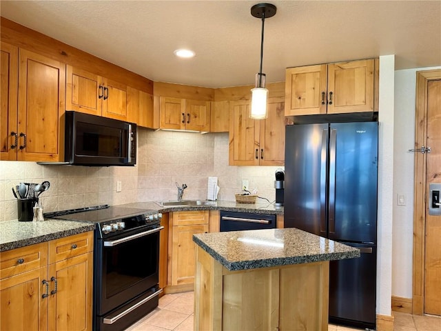 2300 Mount Werner Cir Unit 631, Steamboat Springs, CO 80487 - kitchen featuring black appliances, light tile patterned floors, and backsplash