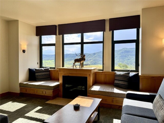 2300 Mount Werner Cir Unit 631, Steamboat Springs, CO 80487 - living room featuring a mountain view and wood finished floors