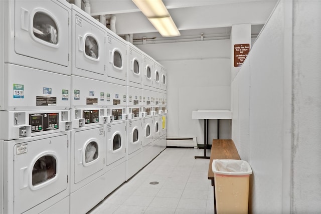 753 Straight Creek Dr Unit 304, Dillon, CO 80435 - community laundry room featuring stacked washer and clothes dryer, washer and dryer, and a baseboard heating unit