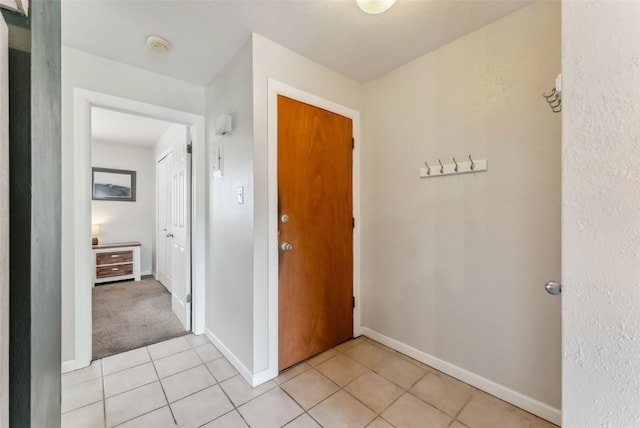 753 Straight Creek Dr Unit 304, Dillon, CO 80435 - hall with light tile patterned floors and baseboards