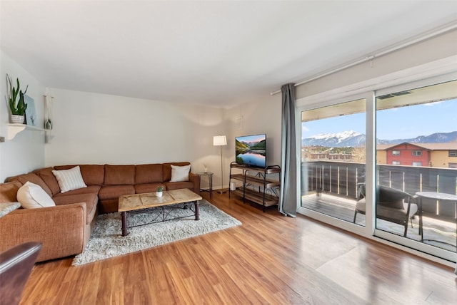 753 Straight Creek Dr Unit 304, Dillon, CO 80435 - living room featuring wood finished floors