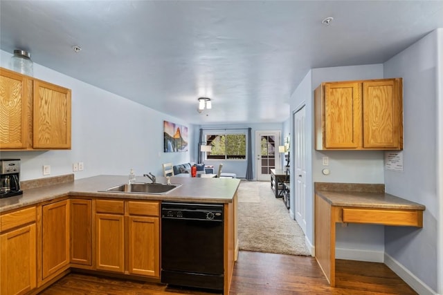 2545 Cattle Kate Cir Unit 3207, Steamboat Springs, CO 80487 - kitchen featuring black dishwasher, a sink, a peninsula, dark wood-style flooring, and open floor plan
