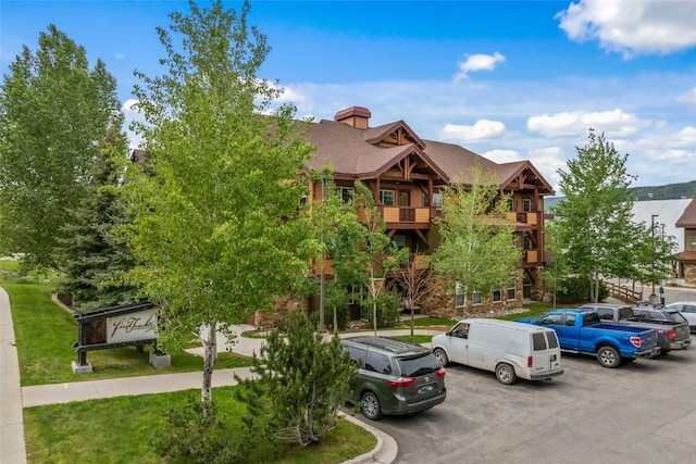 2545 Cattle Kate Cir Unit 3207, Steamboat Springs, CO 80487 - view of building exterior featuring uncovered parking